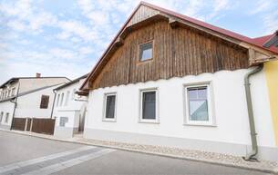 Wohnen Einfamilienhaus Charmantes Einfamilienhaus mit 40 m² Terrassenfläche 2123 Hautzendorf